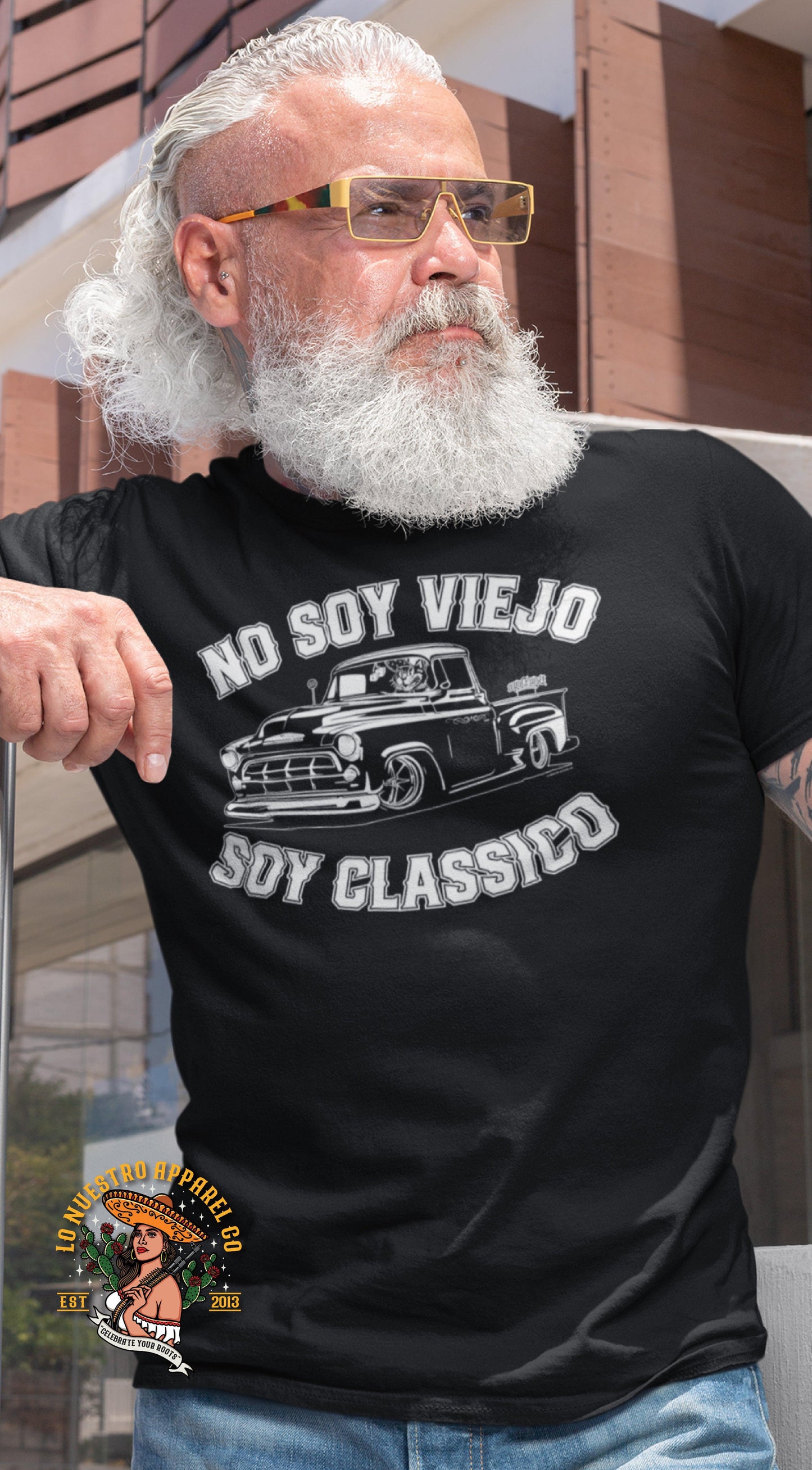Close-up of a man wearing the No Soy Viejo, Soy Classico T-Shirt, perfect for showcasing Chicano style and pride.