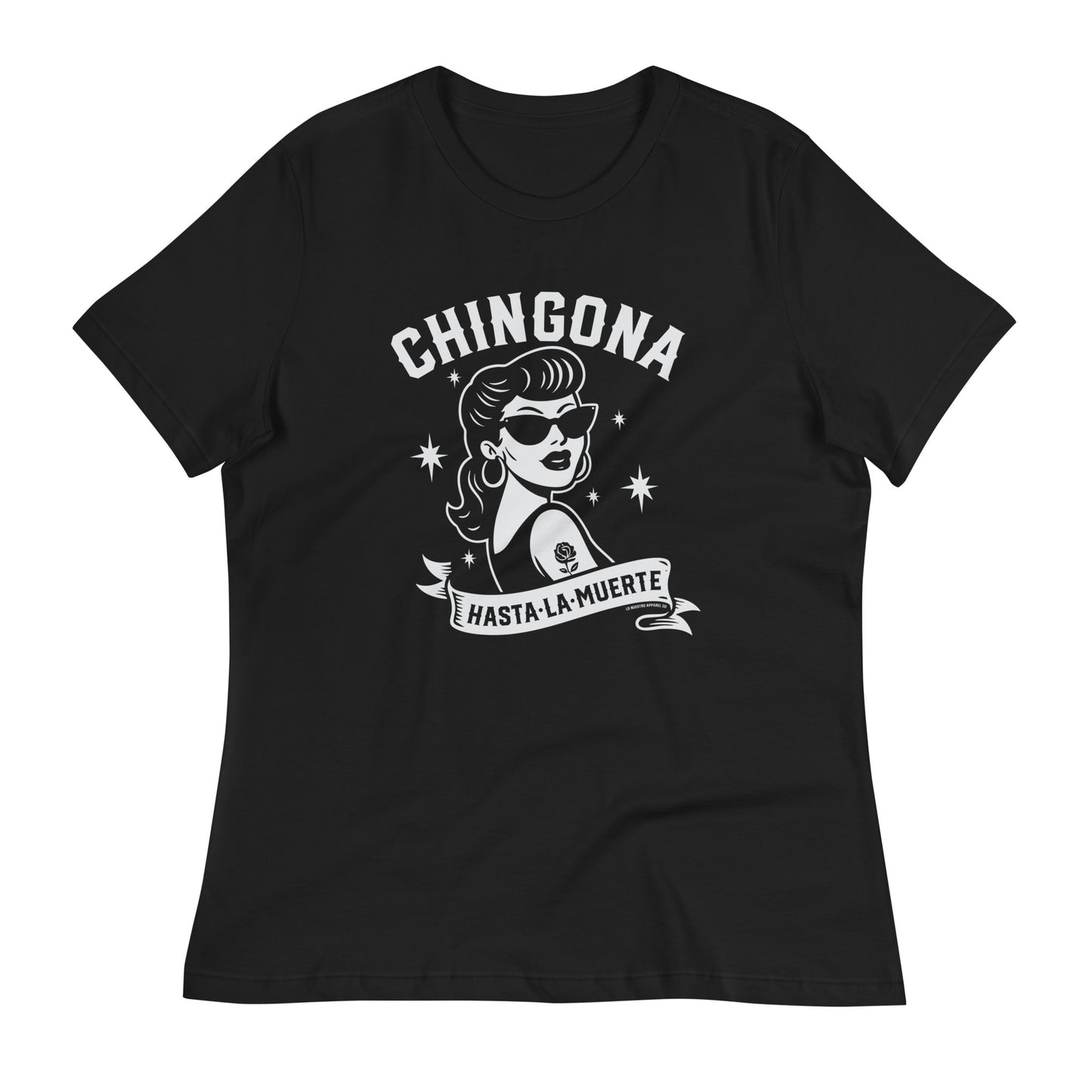 Black Chicana shirt displayed on a white background, featuring a retro-style Latina graphic and Chingona Hasta La Muerte banner. Product mockup