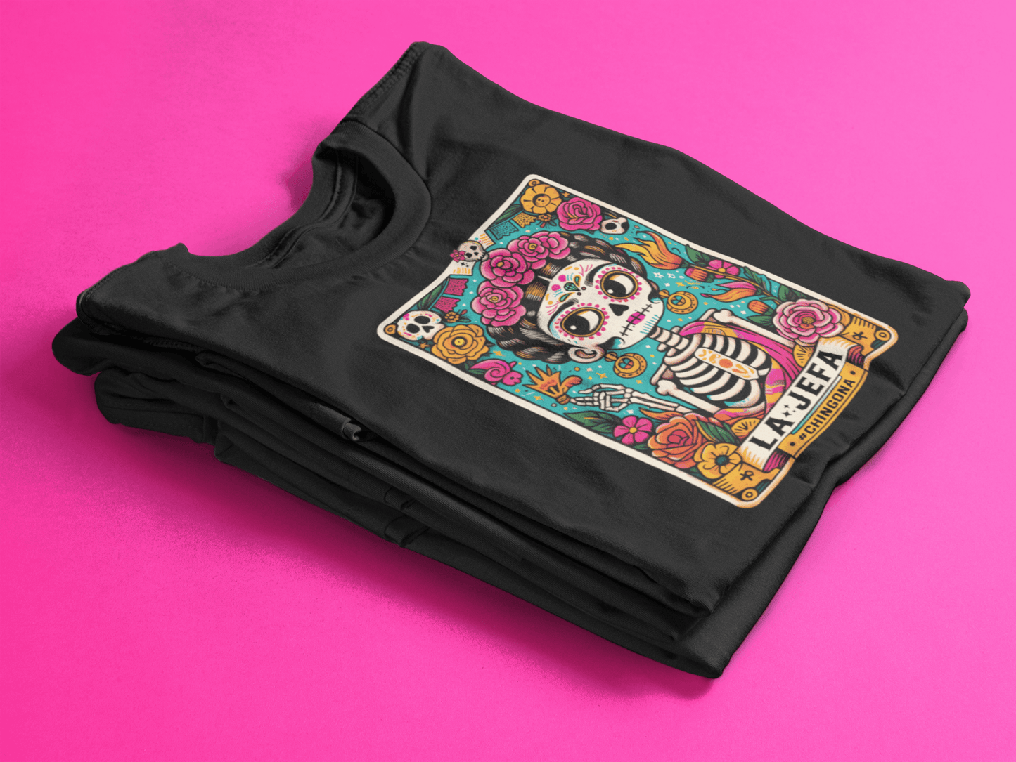 Close-up of a black women's t-shirt with a colorful 'La Jefa' tarot card graphic, perfect for Dia de los Muertos celebrations.