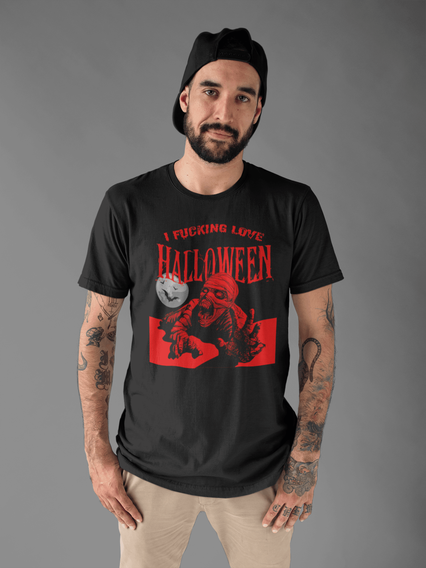 Man wearing I Fucking Love Halloween Men's T-Shirt with mummy graphic – Funny Halloween T-Shirt, Sarcastic Halloween Shirt, Men's Halloween Apparel.