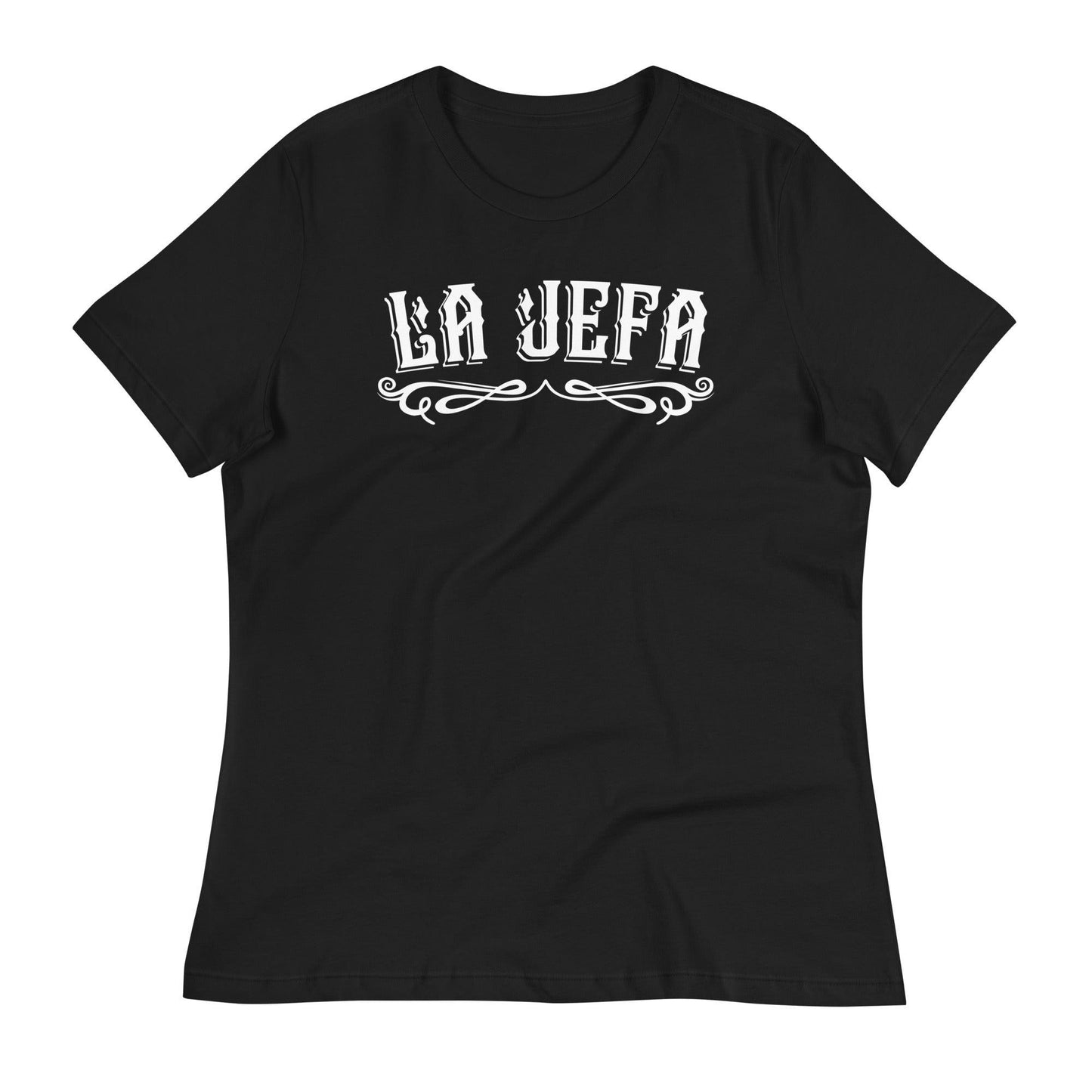 La Jefa Shirt laid flat with a natural wrinkled texture, featuring a bold Chicana graphic tee design. A must-have for mujeres repping Jefa energy.