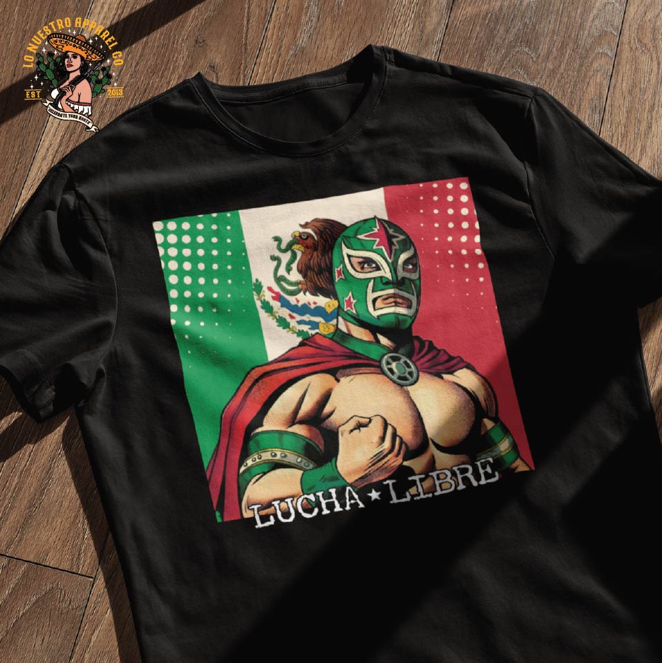 The Lucha Libre Luchador shirt displayed on a wooden floor and the Lo Nuestro Apparel Co logo. The best in Chicano Clothing, funny Mexican T Shirts and Chicano Shirts