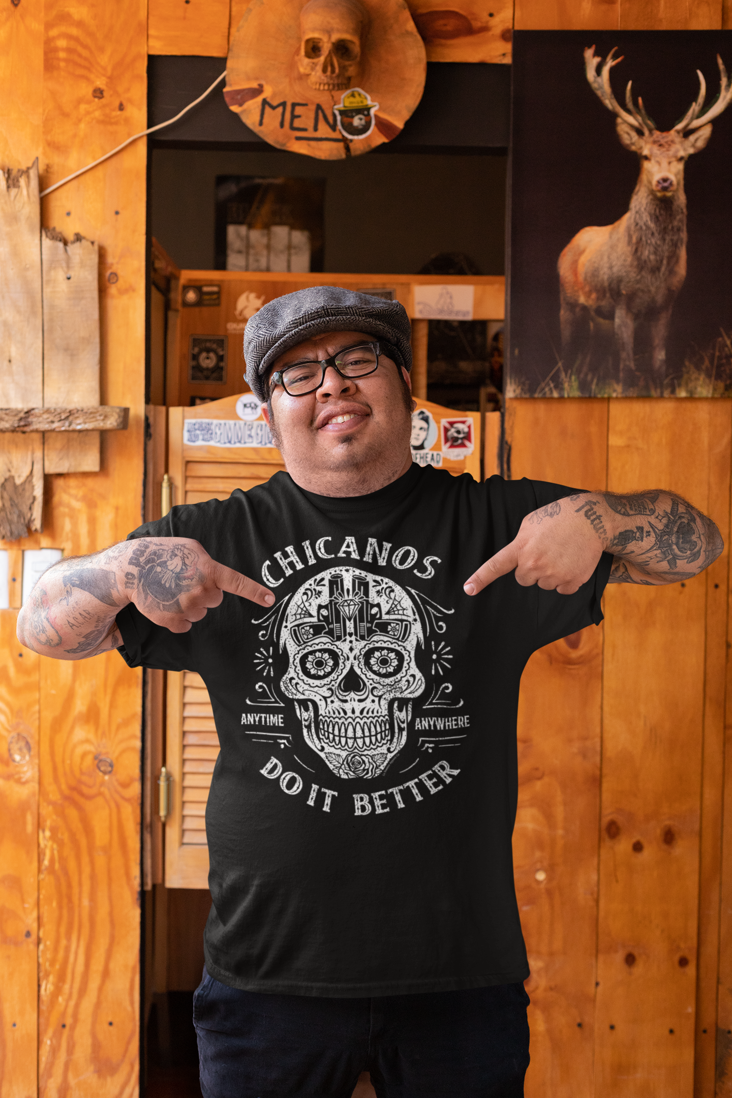 Model wearing the "Chicanos Do It Better" T-shirt to show the relaxed fit and comfortable style.