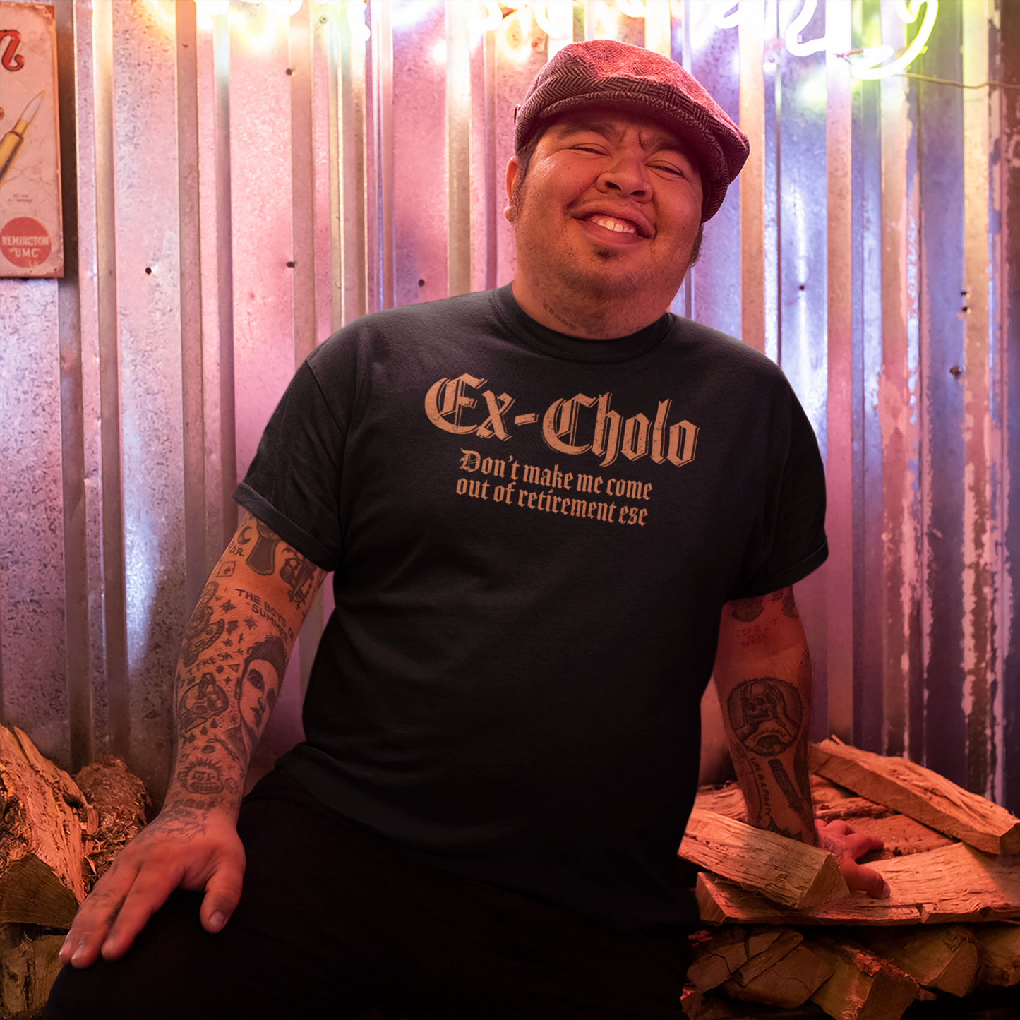 Model showcasing the relaxed fit and vintage design of the "Ex-Cholo" T-shirt.