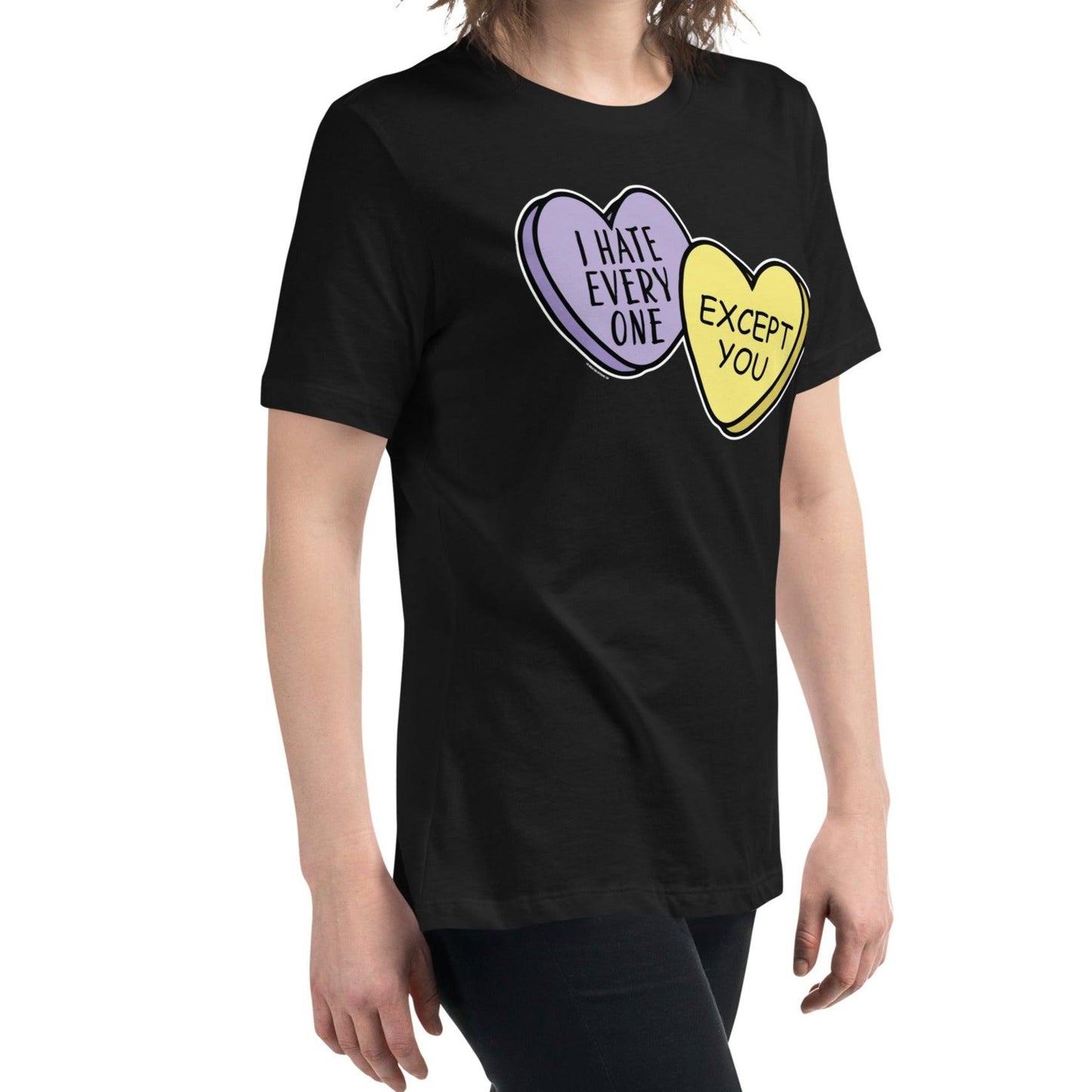 Woman wearing a sarcastic Valentine’s Day T-Shirt with two candy hearts reading 'I Hate Everyone Except You.' A funny and unique women’s Valentine’s shirt for casual wear.