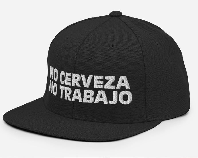 Black snapback hat with "No Cerveza No Trabajo" text in white, adjustable fit, inspired by a comedy starring a Chicano comedian. Perfect for men, includes "No Cerveza No Trabajo" meaning.