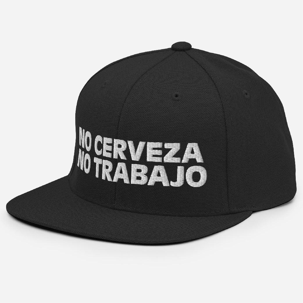 Black snapback hat with "No Cerveza No Trabajo" text in white, adjustable fit, inspired by a comedy starring a Chicano comedian. Perfect for men, includes "No Cerveza No Trabajo" meaning.
