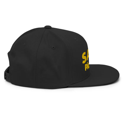 Black snapback hat with "Salsa Picaculo" text in yellow, featuring a flat bill and adjustable snapback closure.