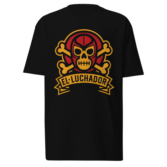Flat lay of a black El Luchador t-shirt on a white background, showcasing a bold red and yellow masked skull and crossbones design with a banner.
