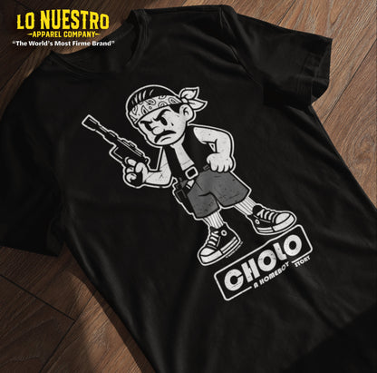 Flat lay of a black t-shirt featuring a funny Mexican shirt design with a cholo cartoon character and the phrase A Homeboy Story.