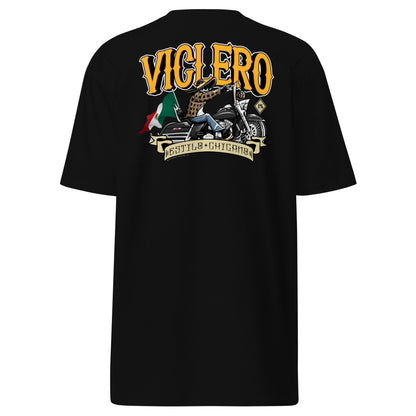 "Viclero Estilo Chicano" T-shirt with bold yellow graphic on a black background.