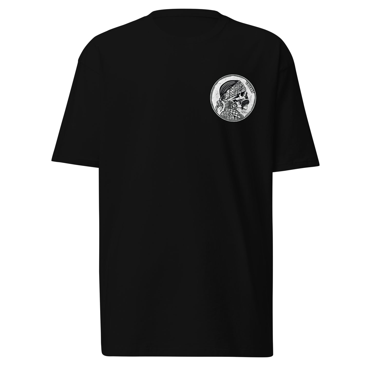 Front view of black "In Raza We Trust" T-shirt featuring a coin-inspired design with text.