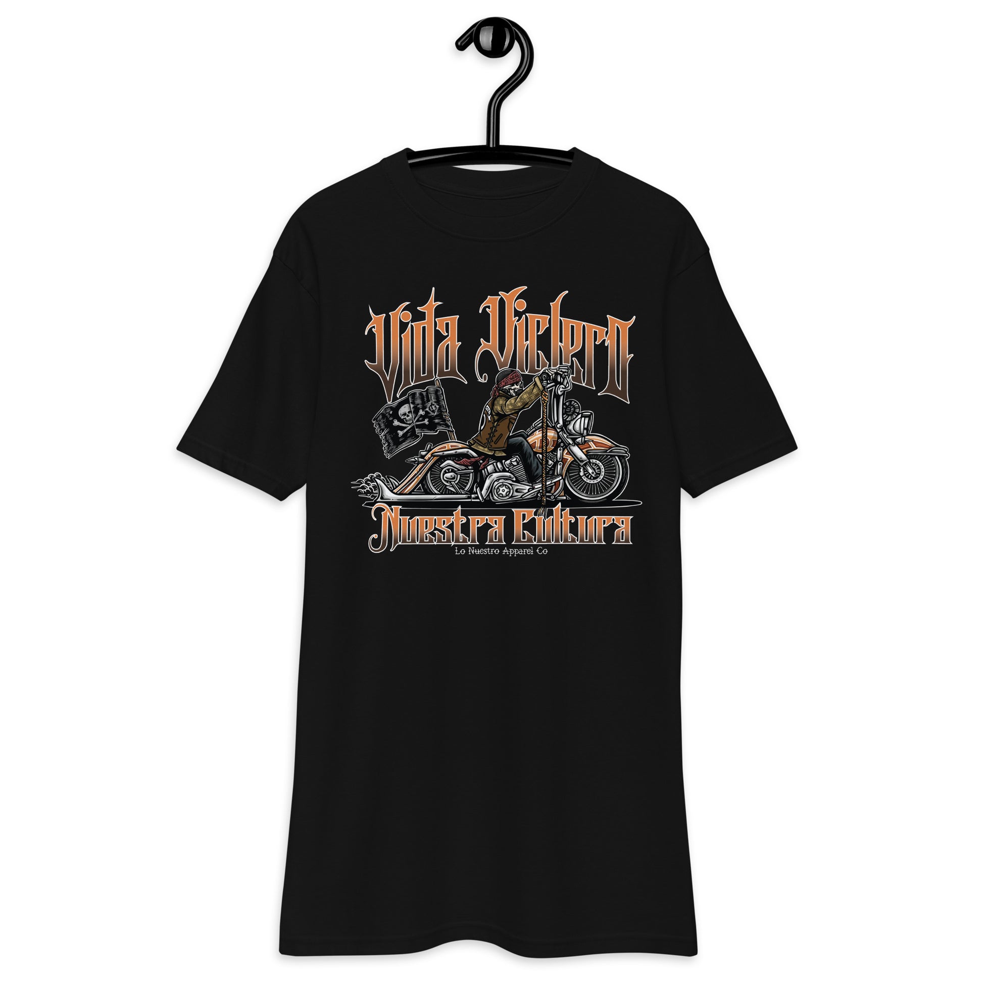 Front view of black "Vida Viclero" T-shirt featuring a skeleton riding a Vicla with "Vida Viclero" and "Nuestra Cultura" text.