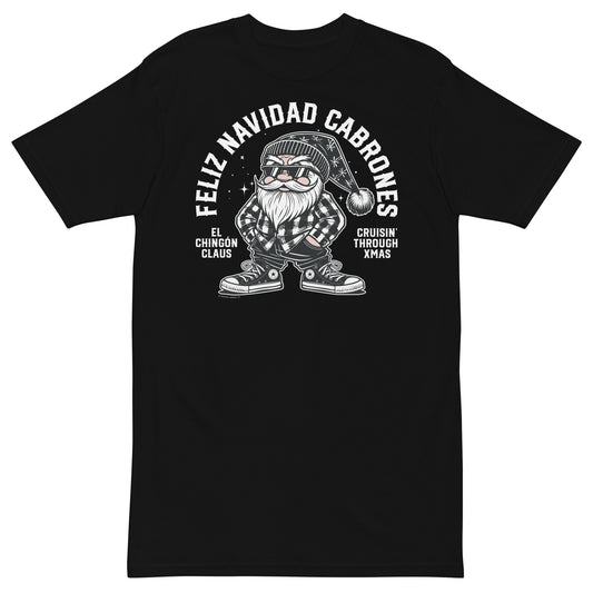 Flat-lay of a black 'Feliz Navidad Cabrones' t-shirt featuring El Chingón Claus and the words 'Cruisin’ through Xmas' in a bold, festive design."