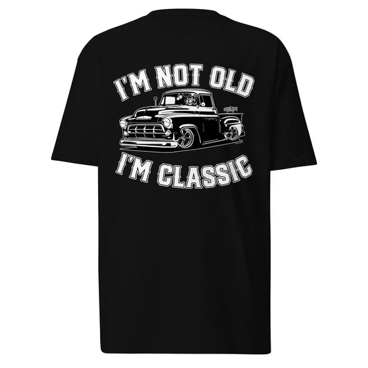 Front view of 'I'm Not Old, I'm Classic' t-shirt in black, featuring a vintage truck graphic and bold lettering.