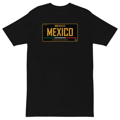 A black t-shirt with a Mexico license plate graphic, showcasing gold lettering and Mexican flag colors.