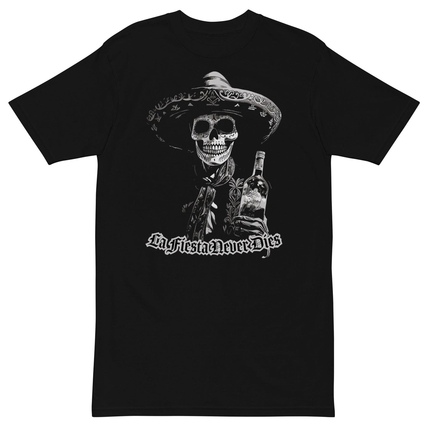 Black t-shirt laid on a white background, featuring a bold 'La Fiesta Never Dies' Dia de los Muertos design with a charro skeleton holding a bottle.