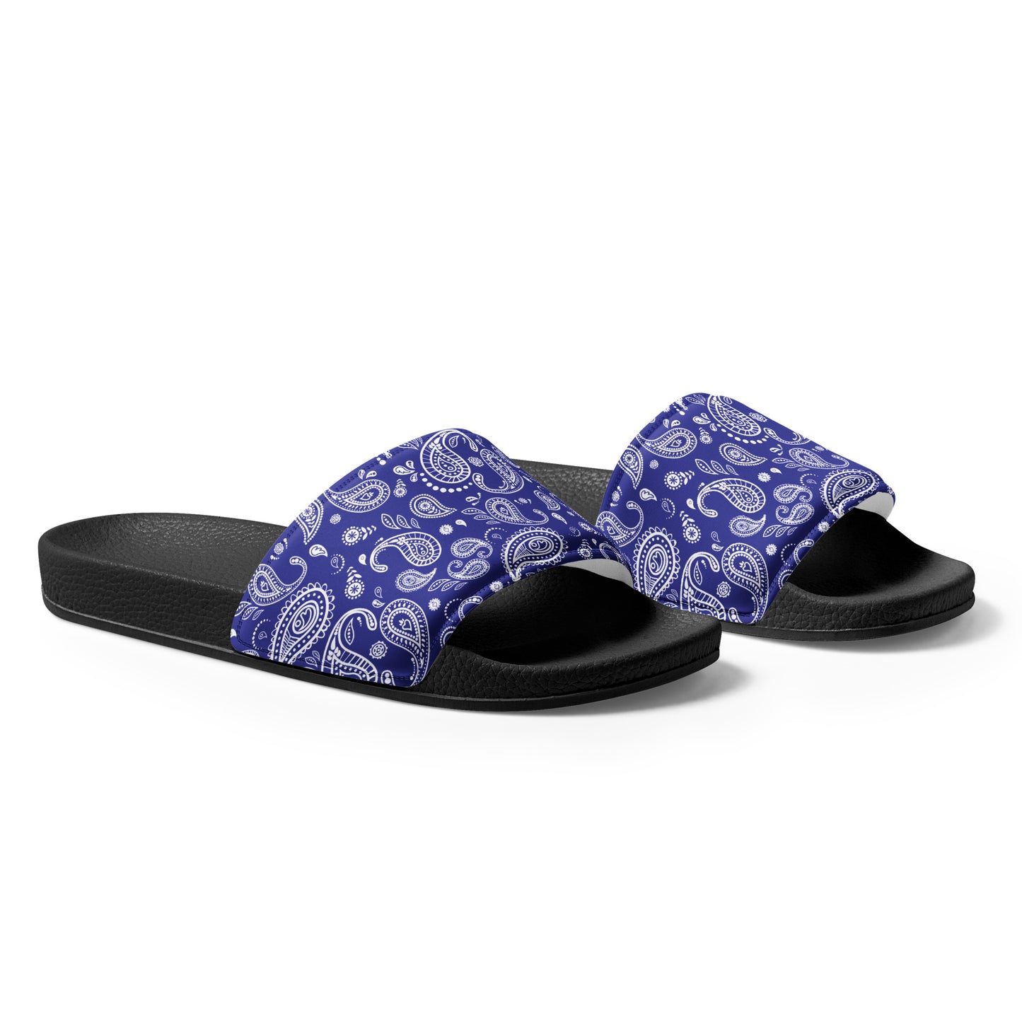 Side view of the slides highlighting the contoured, textured footbed for maximum comfort.