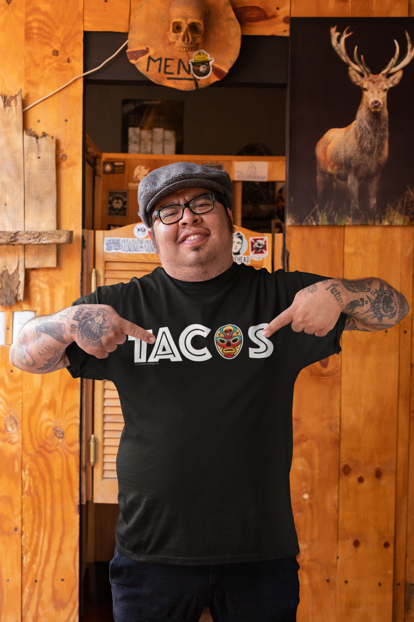 Model showcasing the relaxed fit and stylish design of the "TACOS" T-shirt.