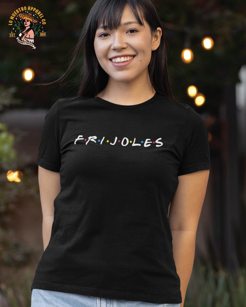 Young and beautiful Hispanic model wearing a black Frijoles Tshirt. This is a parody of the FRIENDS logo in a Chicano Clothing twist. Meant to be a funny Mexican T Shirt.