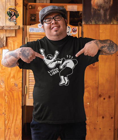 A model wearing the Lucha Libre Shirt Los Luchadores in a pub. The shirt is part of the funny Mexican T Shirts collection that includes the Lucha Libre line of shirts