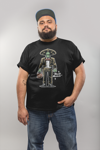 Plus-size man wearing a black t-shirt featuring a 'Muerto Mariachi' design, showcasing a green, zombie-like mariachi character in full attire with a jack-o-lantern bucket, standing confidently.