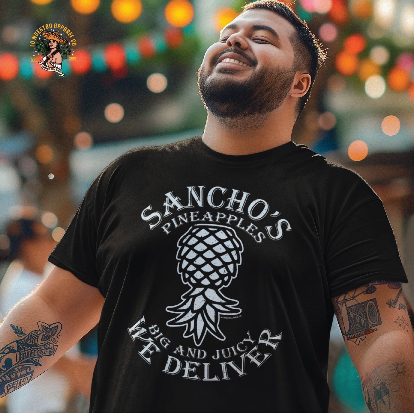 A young Hispanic male wearing the Sanho's Pineapples Tshirt. Part of our upside down pineapple shirt collection.