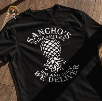 Our Sancho's Pineapples tshirt on a wooden floor. Part of the Upside down pineapple shirts collection.