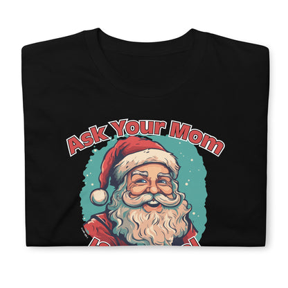 "Ask Your Mom If I'm Real" Unisex Funny Christmas T-Shirt laid flat, showcasing the Santa Claus graphic – Funny Christmas T-Shirt, Sarcastic Holiday Shirt, Holiday Humor Clothing.