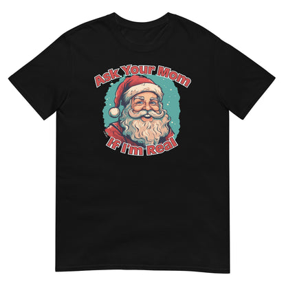 Flat lay of "Ask Your Mom If I'm Real" Unisex Funny Christmas T-Shirt showing Santa graphic – Funny Christmas T-Shirt, Sarcastic Holiday Shirt, Vintage Santa Graphic.