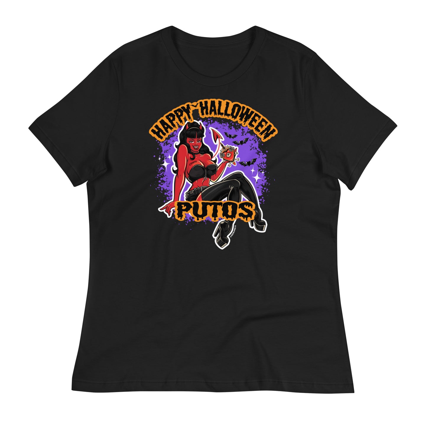  Black T-shirt with a colorful devil girl graphic and the text "Happy Halloween Putos" in orange and purple splatter design, laid flat on a white background.