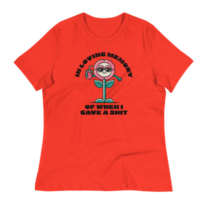 In Loving Memory of When I Gave a Sh*t' T-Shirt in vibrant Poppy red, featuring a fun cartoon flower graphic with a humorous twist.